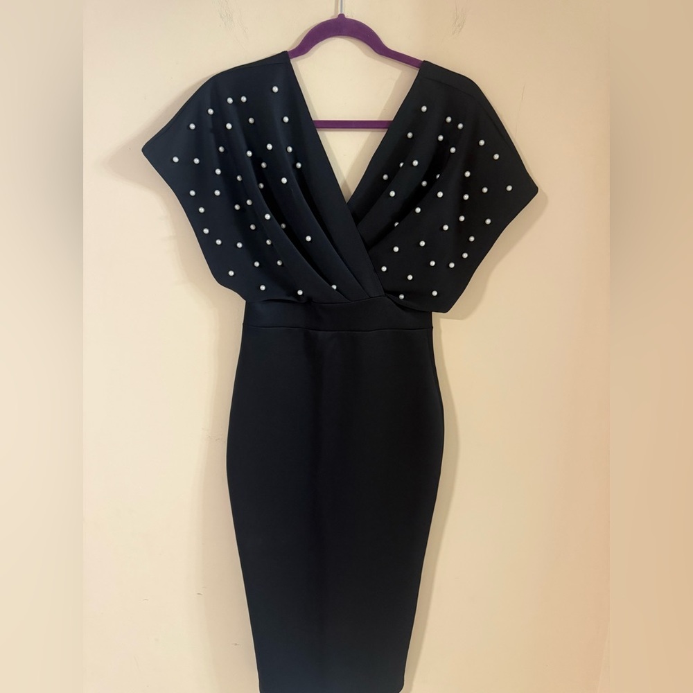Elegant Black Dress with Pearl Accents